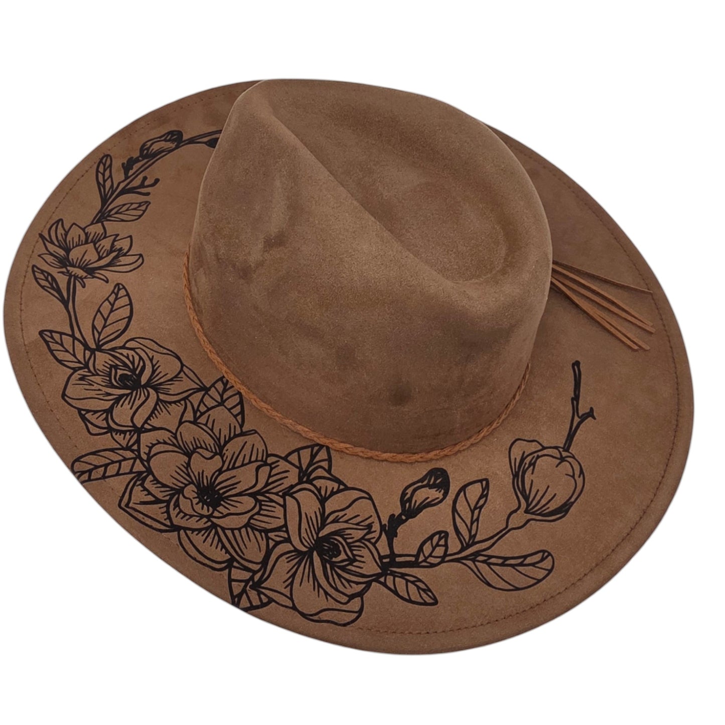 Elkhorn Designs chestnut vegan suede wide brim hat with intricate laser-engraved gardenia floral design and tassel.
