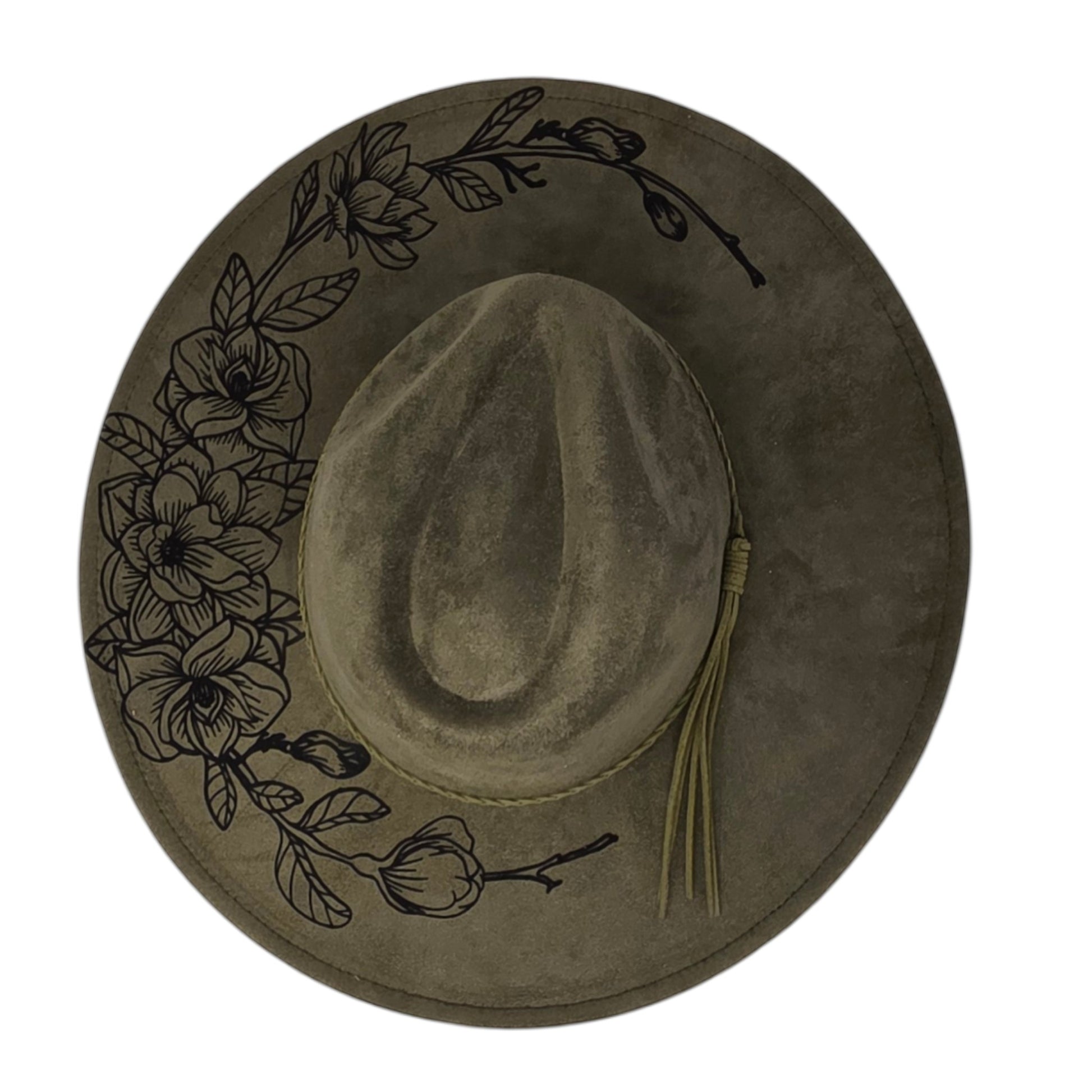 Elkhorn Designs vegan suede wide brim hat in sage green with a laser-engraved gardenia floral design and tassel band.